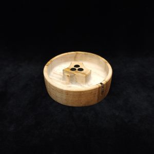 This image portrays DynaPuck XL-Wavy Maple Wood-Dynavap Stem Display/AVB Holder by Dovetail Woodwork.