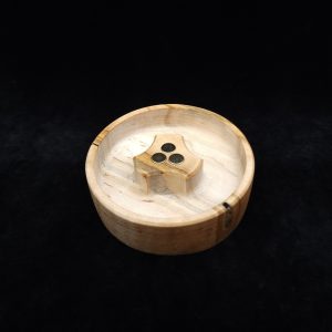 This image portrays DynaPuck XL-Wavy Maple Wood-Dynavap Stem Display/AVB Holder by Dovetail Woodwork.