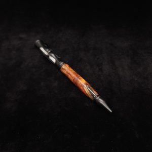 This image portrays Amboyna Burl Wood-Matte Black Hourglass Pen by Dovetail Woodwork.