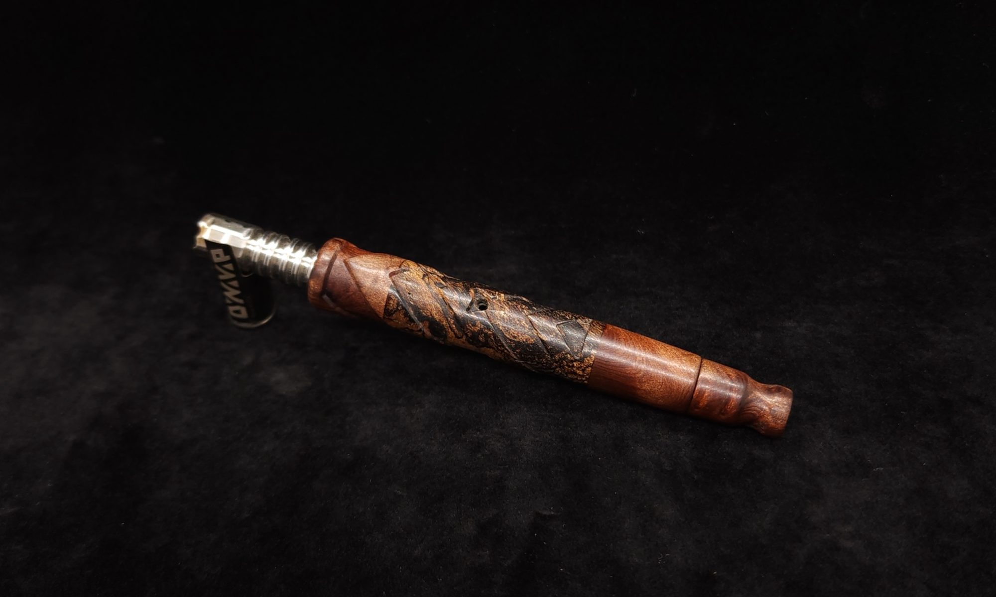 This image portrays V-7 Dynavap XL Stem/Mixed Burl + Matched Mouthpiece by Dovetail Woodwork.