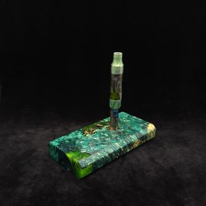 This image portrays 2G-Cosmic Stash-Burl Hybrid-Dynavap Storage Case by Dovetail Woodwork.