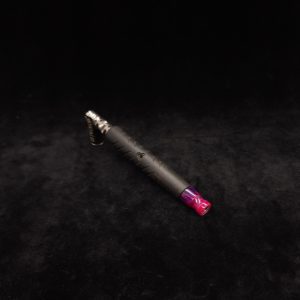 This image portrays Dynavap Spinning Mouthpiece-Metallic Pink/Purple by Dovetail Woodwork.