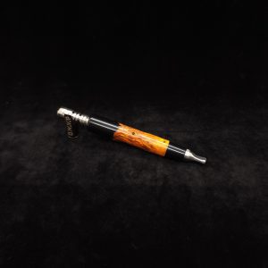 This image portrays Clutch Dynavap XL Burl Hybrid Stem + Ebony Mouthpiece by Dovetail Woodwork.