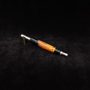 This image portrays Clutch Dynavap XL Burl Hybrid Stem + Ebony Mouthpiece by Dovetail Woodwork.