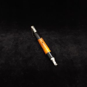 This image portrays Clutch Dynavap XL Burl Hybrid Stem + Ebony Mouthpiece by Dovetail Woodwork.