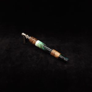 This image portrays Luminescent Widow Dynavap Stem XL-Hybrid + M.P. by Dovetail Woodwork.