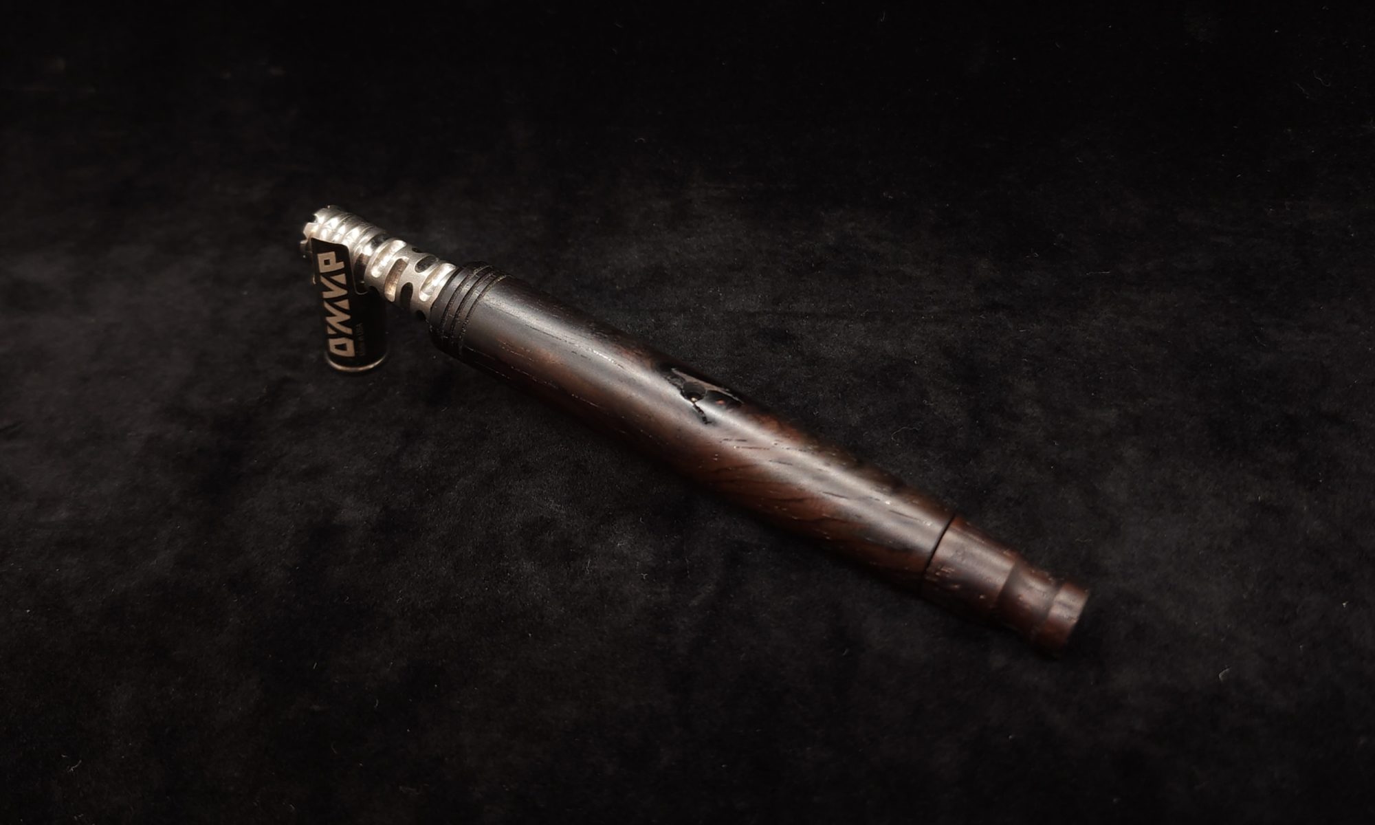 This image portrays Straight Tapered XL Dynavap Cocobolo Burl Stem + Matching Mouthpiece by Dovetail Woodwork.