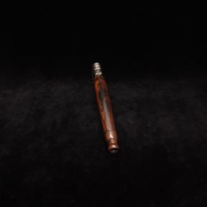 This image portrays Tapered Dynavap XL Cocobolo Stem + Matching Mouthpiece by Dovetail Woodwork.