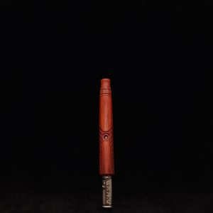 This image portrays Dynavap Spinning Mouthpiece-Specialty Bloodwood by Dovetail Woodwork.