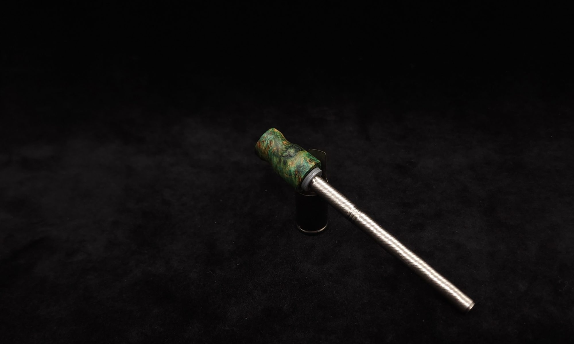 This image portrays Dynavap Spinning Mouthpiece-Blue/Teal Elm Burl by Dovetail Woodwork.