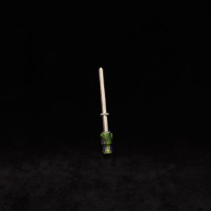 This image portrays Dynavap Spinning Mouthpiece-Metallic Green/Purple by Dovetail Woodwork.