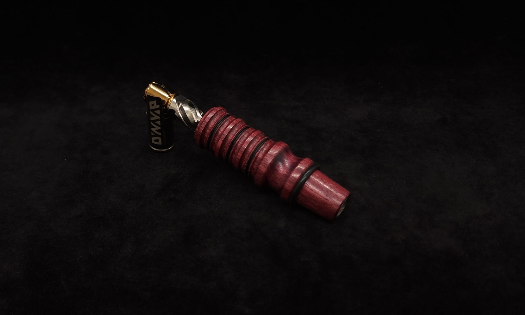 This image portrays Dynavap 14mm WPA Stem-S.S. Metal Core-Purpleheart-NEW! by Dovetail Woodwork.