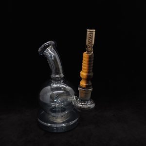 This image portrays Dynavap 14mm WPA Stem-S.S. Metal Core-Desert Ironwood-NEW! by Dovetail Woodwork.