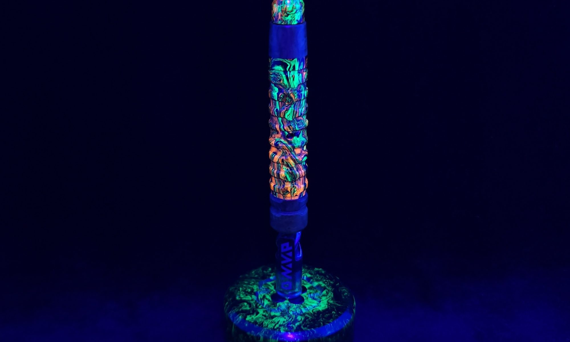 This image portrays Fractured Dynavap XL Hybrid Luminescent Stem + Matching Mouthpiece by Dovetail Woodwork.