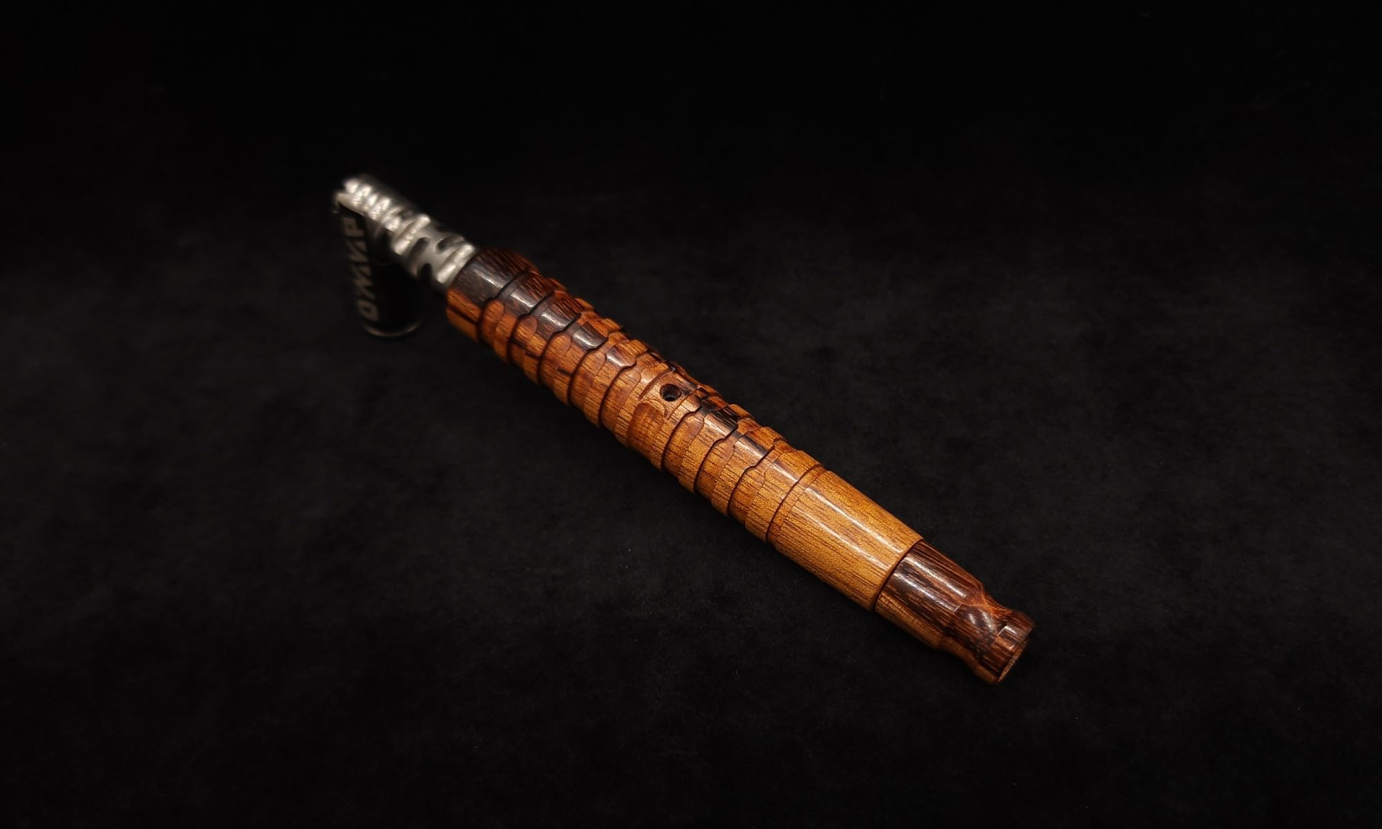 This image portrays Fractured Dynavap XL Stem/Tiger Wood+Matching Mouthpiece-NEW! by Dovetail Woodwork.