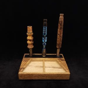 This image portrays DynaTray-Dynavap Stem Display Holder/Sorting Tray-Black Limba by Dovetail Woodwork.