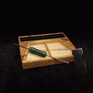 This image portrays DynaTray-Dynavap Stem Display Holder/Sorting Tray-Black Limba by Dovetail Woodwork.