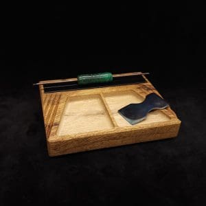 This image portrays DynaTray-Dynavap Stem Display Holder/Sorting Tray-Black Limba by Dovetail Woodwork.