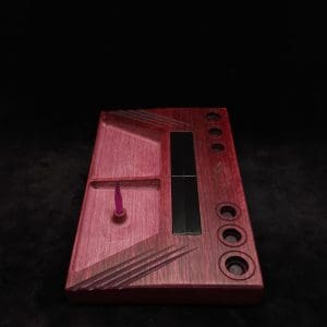 This image portrays DynaTray-Dynavap Stem Display Holder/Sorting Tray-Purpleheart Wood by Dovetail Woodwork.