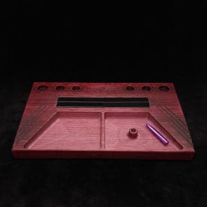 This image portrays DynaTray-Dynavap Stem Display Holder/Sorting Tray-Purpleheart Wood by Dovetail Woodwork.