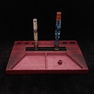 This image portrays DynaTray-Dynavap Stem Display Holder/Sorting Tray-Purpleheart Wood by Dovetail Woodwork.