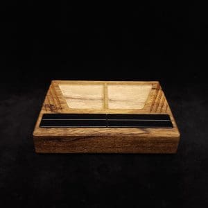 This image portrays DynaTray-Dynavap Stem Display Holder/Sorting Tray-Black Limba by Dovetail Woodwork.