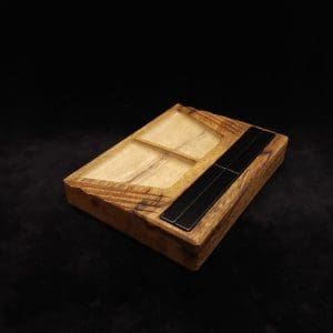 This image portrays DynaTray-Dynavap Stem Display Holder/Sorting Tray-Black Limba by Dovetail Woodwork.