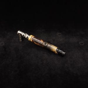 This image portrays Attenuated Dynavap XL Burl Hybrid Stem + Matching Mouthpiece by Dovetail Woodwork.