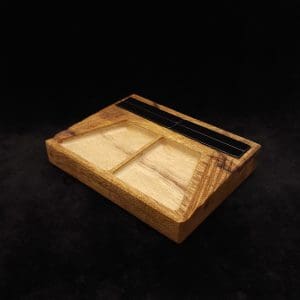 This image portrays DynaTray-Dynavap Stem Display Holder/Sorting Tray-Black Limba by Dovetail Woodwork.