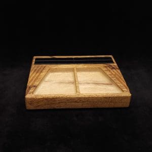 This image portrays DynaTray-Dynavap Stem Display Holder/Sorting Tray-Black Limba by Dovetail Woodwork.