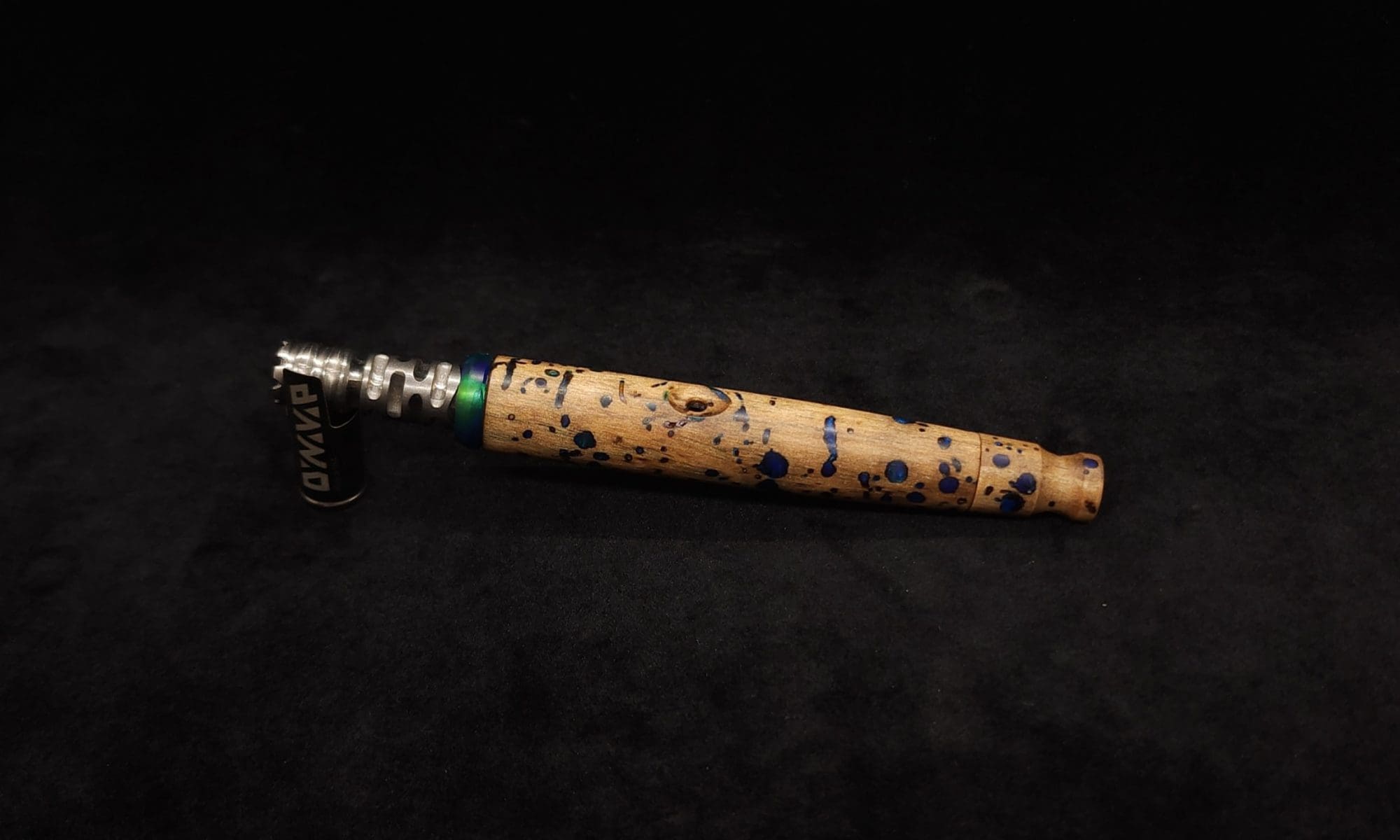 This image portrays Straight Taper Cosmic Burl XL Dynavap Stem + Matching M.P. by Dovetail Woodwork.