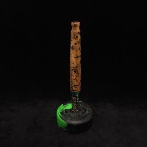 This image portrays Straight Taper Cosmic Burl XL Dynavap Stem + Matching M.P. by Dovetail Woodwork.