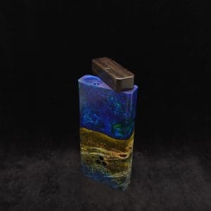 This image portrays Dynavap Device/Material Storage Case-Cosmic Burl (XL) Hybrid by Dovetail Woodwork.