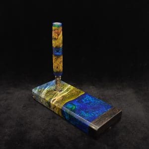 This image portrays Dynavap Device/Material Storage Case-Cosmic Burl (XL) Hybrid by Dovetail Woodwork.