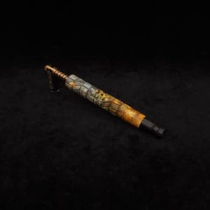 This image portrays Dynavap-Twisted Stem Burl XL + Ebony M.P. by Dovetail Woodwork.