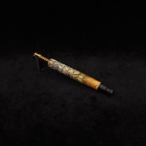 This image portrays Dynavap-Twisted Stem Burl XL + Ebony M.P. by Dovetail Woodwork.