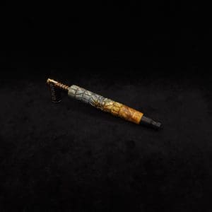 This image portrays Dynavap-Twisted Stem Burl XL + Ebony M.P. by Dovetail Woodwork.