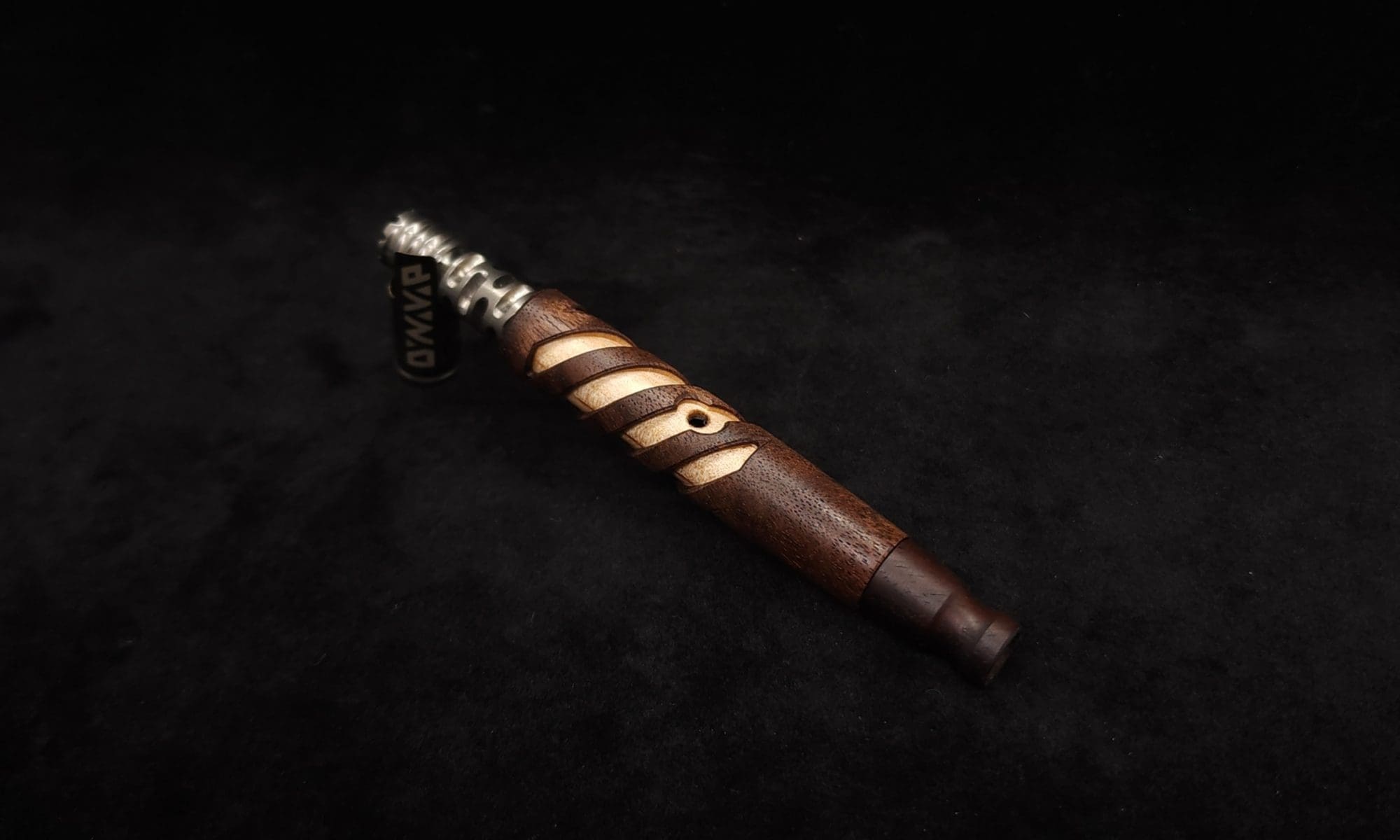 This image portrays Layered Helical Dynavap (Standard) Stem + Matched Mouthpiece-NEW! by Dovetail Woodwork.