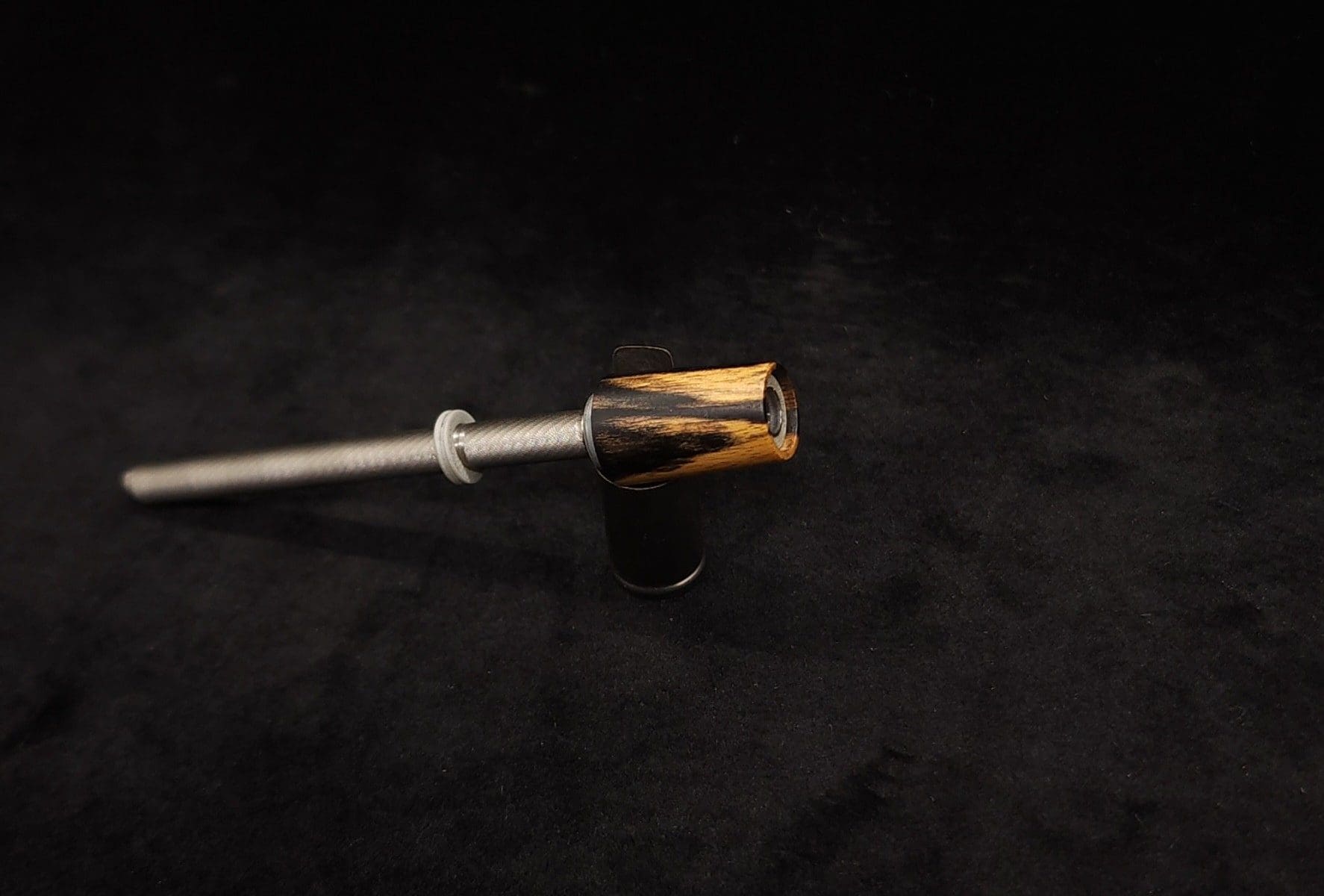 This image portrays Dynavap Spinning Mouthpiece-High Class M.P.-B & W Ebony by Dovetail Woodwork.