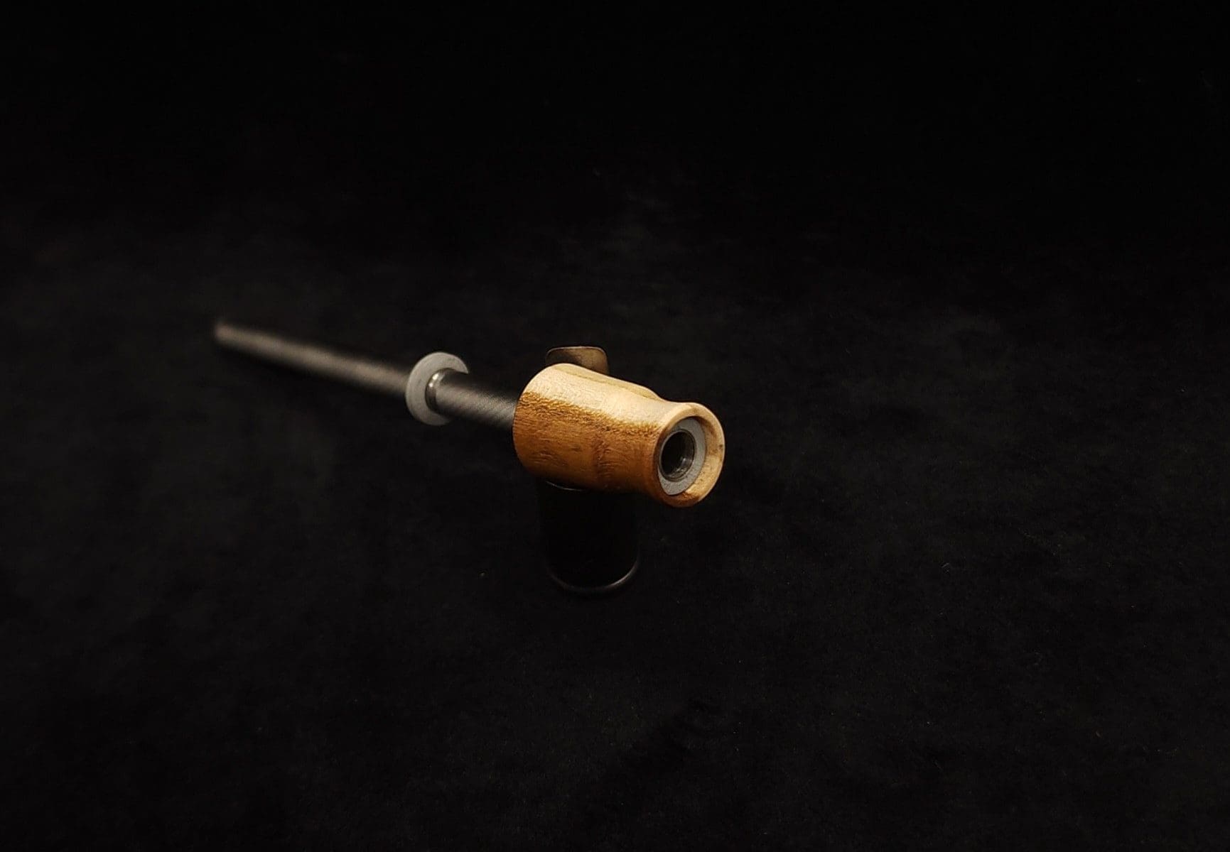 This image portrays Dynavap Spinning Mouthpiece-High Class M.P. - Elm Wood by Dovetail Woodwork.