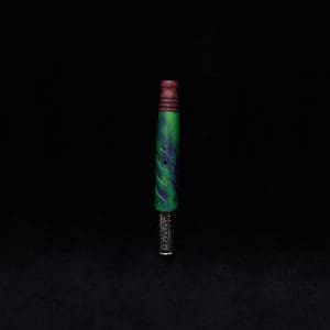 This image portrays Helical Dynavap (Standard) Luminescent Stem + Purpleheart M.P.-NEW by Dovetail Woodwork.