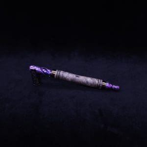 This image portrays The Dynavap WoodWynd-Customized/Anodized Dovetail Woodwork Variant-Special! by Dovetail Woodwork.