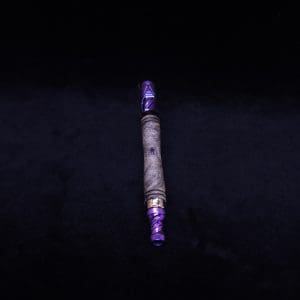 This image portrays The Dynavap WoodWynd-Customized/Anodized Dovetail Woodwork Variant-Special! by Dovetail Woodwork.