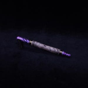 This image portrays The Dynavap WoodWynd-Customized/Anodized Dovetail Woodwork Variant-Special! by Dovetail Woodwork.