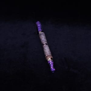 This image portrays The Dynavap WoodWynd-Customized/Anodized Dovetail Woodwork Variant-Special! by Dovetail Woodwork.