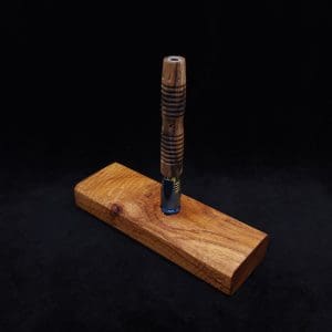 This image portrays Dynavap Device/Material Storage Case-Walnut Burl-Slim XL by Dovetail Woodwork.