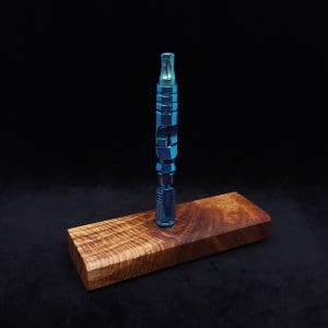 This image portrays Dynavap Device Dugout/Material Storage Case-Walnut Burl-Slim Stash XL by Dovetail Woodwork.