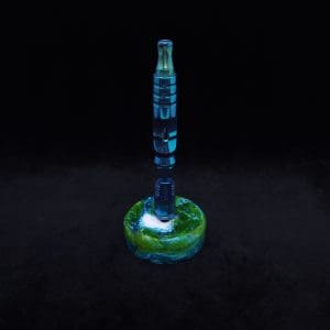 This image portrays DynaPuck-Cosmic Series-Dynavap Stem Display Luminescent by Dovetail Woodwork.