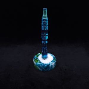 This image portrays DynaPuck-Cosmic Series-Dynavap Stem Display Luminescent by Dovetail Woodwork.