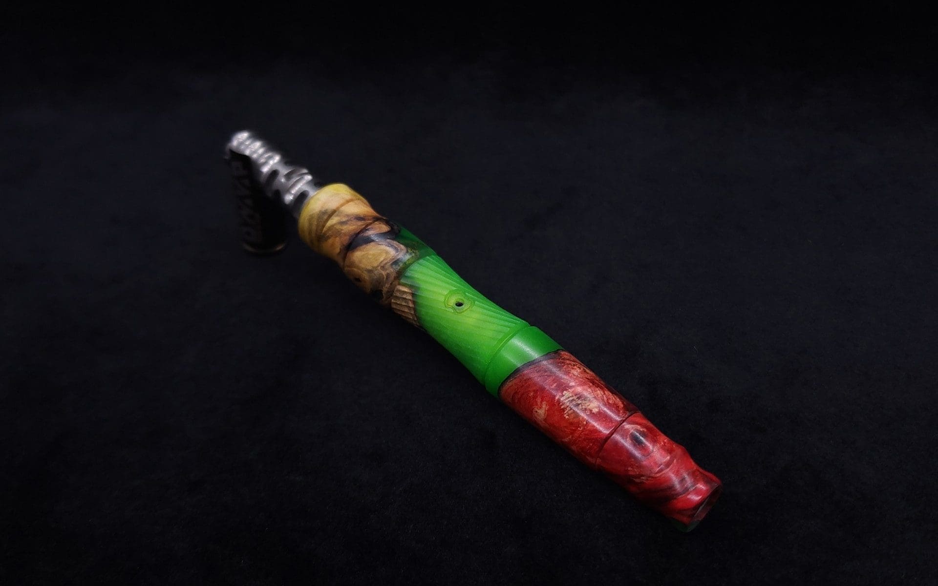 This image portrays Spiraled Hourglass XL Burl Hybrid Luminescent Dynavap Stem + Book-Matched M.P. - NEW! by Dovetail Woodwork.